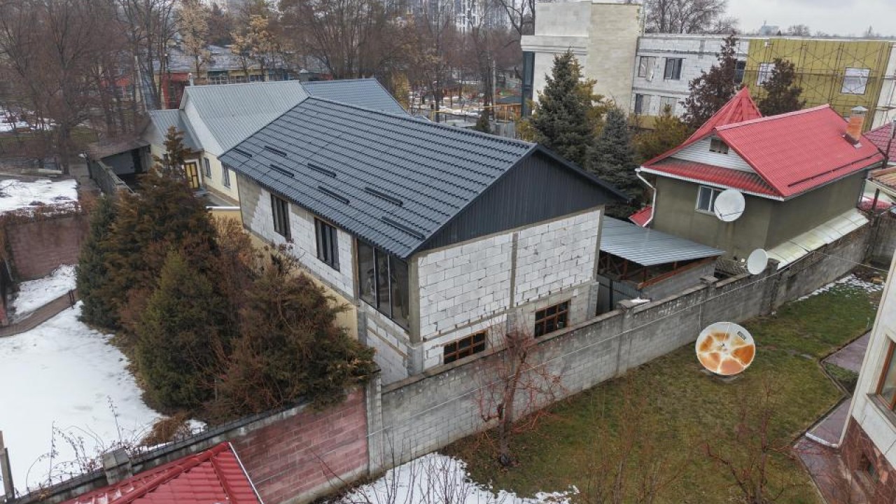 Two-story extension to house being demolished in Almaty