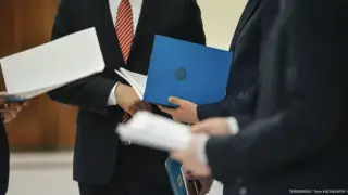 Kazakhstan Proposes New Law to Boost Civil Servant Salaries and Benefits