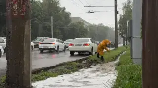 Almaty Ramps Up Services Amidst Heavy Rainfall and Storm Warnings